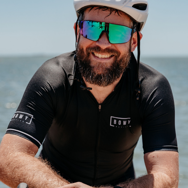 Man in Midnight Black Cycling Jersey front shot on bike